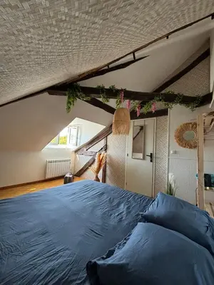 Un ou plusieurs lits dans un hébergement de l'établissement Jungle Cosy