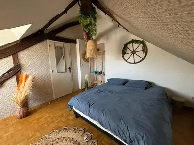Un ou plusieurs lits dans un hébergement de l'établissement Jungle Cosy