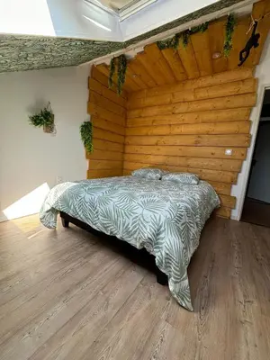 Un ou plusieurs lits dans un hébergement de l'établissement Jungle Cosy