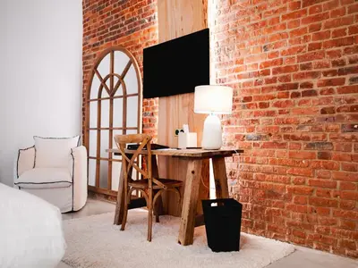 Télévision ou salle de divertissement dans l'établissement Hôtel Château Héloïse