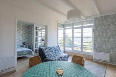 Un ou plusieurs lits dans un hébergement de l'établissement Mélodie - Bel appartement vue mer