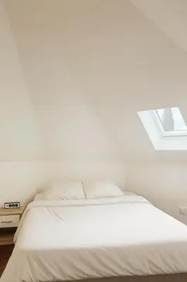 Un ou plusieurs lits dans un hébergement de l'établissement Chambre privée 
