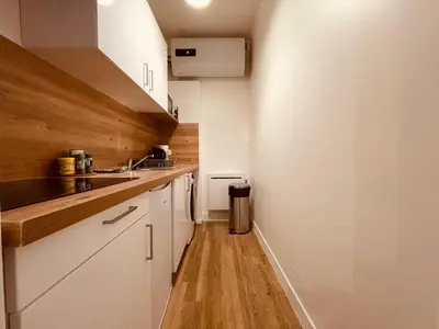 Cuisine ou kitchenette dans l'établissement Le petit Gervais - 289