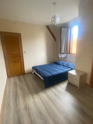 Un ou plusieurs lits dans un hébergement de l'établissement Maison calme