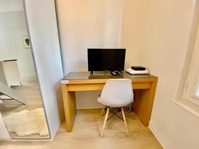 Télévision ou salle de divertissement dans l'établissement SAINT PATRICE