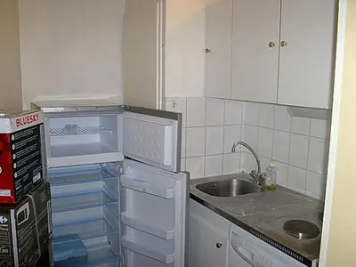 Cuisine ou kitchenette dans l'établissement Pret à usage & Commodat Résidence Foch Saint-Louis - 30 nuitées minimum - Salarié mobilité ou étudiant stagiaire