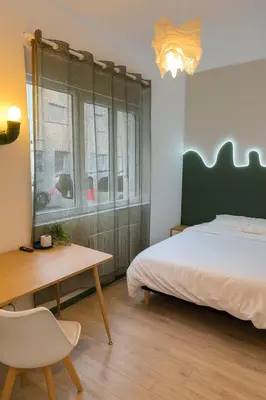 Un ou plusieurs lits dans un hébergement de l'établissement Chambre privée 