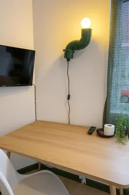 Télévision ou salle de divertissement dans l'établissement Chambre privée 