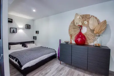 Un ou plusieurs lits dans un hébergement de l'établissement Studio de 40m2 avec terrasse privée, gare à 5 min