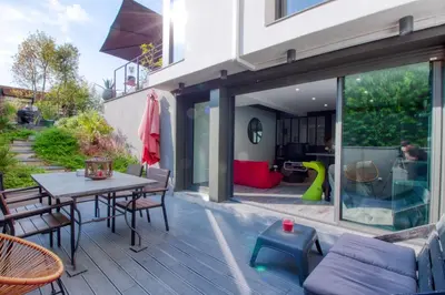 Coin salon dans l'établissement Studio de 40m2 avec terrasse privée, gare à 5 min