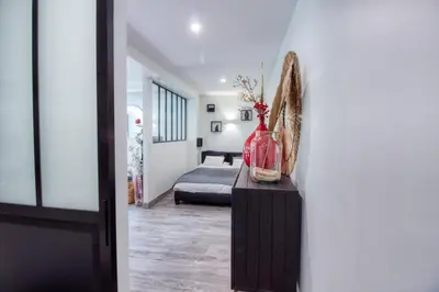 Un ou plusieurs lits dans un hébergement de l'établissement Studio de 40m2 avec terrasse privée, gare à 5 min