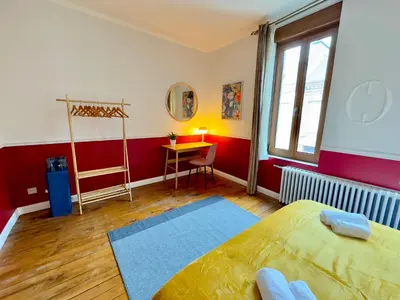 Un ou plusieurs lits dans un hébergement de l'établissement Maison 3ch - Cinéma - Game Room - Parking - Gare