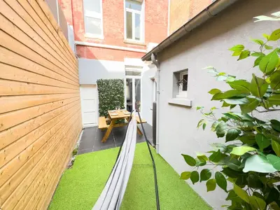 Jardin de l'établissement Maison 3ch - Cinéma - Game Room - Parking - Gare