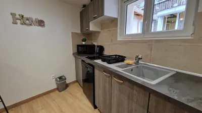 Cuisine ou kitchenette dans l'établissement maison neuve - le laos -