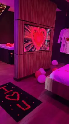 Un ou plusieurs lits dans un hébergement de l'établissement L'Escale Suite & Spa