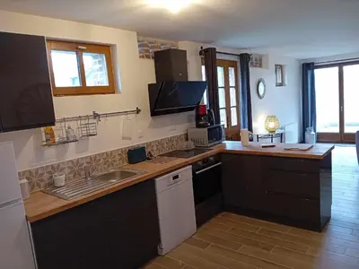 Cuisine ou kitchenette dans l'établissement Gite Ferme du Marronnier