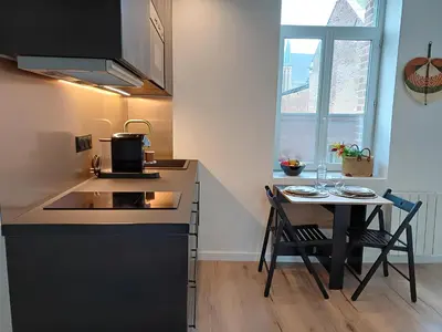Cuisine ou kitchenette dans l'établissement L'escapade - A 5min à pied centre ville & gare