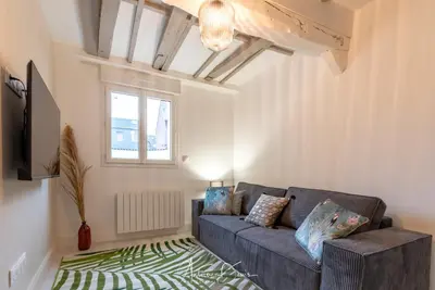 Coin salon dans l'établissement Villa Caron - Appartements haut de gamme avec chambre hyper centre
