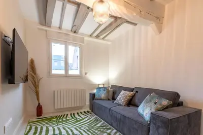 Coin salon dans l'établissement Villa Caron - Appartements haut de gamme avec chambre hyper centre
