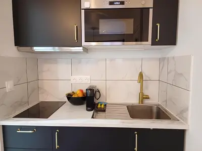 Cuisine ou kitchenette dans l'établissement Pause amiénoise - Proche centre ville - wifi Fibre