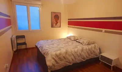 Un ou plusieurs lits dans un hébergement de l'établissement The Family - Bel Appartement 4/6 places