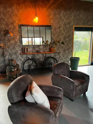Coin salon dans l'établissement Suite avec salon privé 25m2 Wifi Netflix Duclair