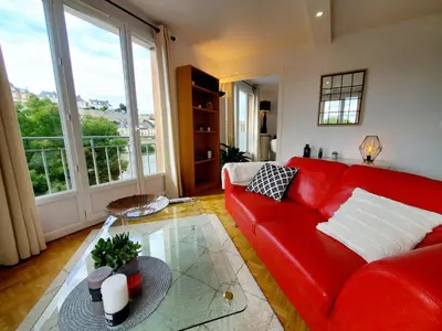 Coin salon dans l'établissement Le Loft de L’Écluse / F2 cosy au bord de l'eau