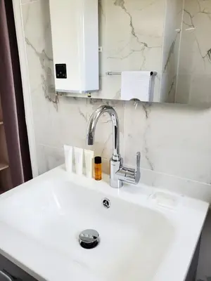 Salle de bains dans l'établissement Le Loft de L’Écluse / F2 cosy au bord de l'eau