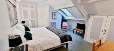 Télévision ou salle de divertissement dans l'établissement Résidence Ma Vallée