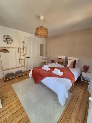Un ou plusieurs lits dans un hébergement de l'établissement Le Cœur du Bien-être - Gîte grande capacité - 6 chambres - Superbe emplacement - Vue Seine - Décoration soignée - Coin touristique