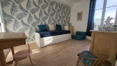 Coin salon dans l'établissement Le Cœur du Bien-être - Gîte grande capacité - 6 chambres - Superbe emplacement - Vue Seine - Décoration soignée - Coin touristique