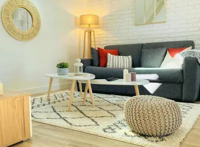 Coin salon dans l'établissement Le Cocon / Duplex de standing en centre-ville