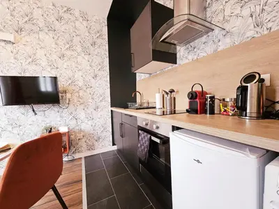 Cuisine ou kitchenette dans l'établissement Le Bain Rouennais
