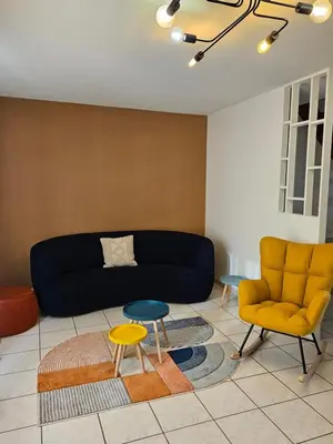 Coin salon dans l'établissement Gite de Amiens Poulainville