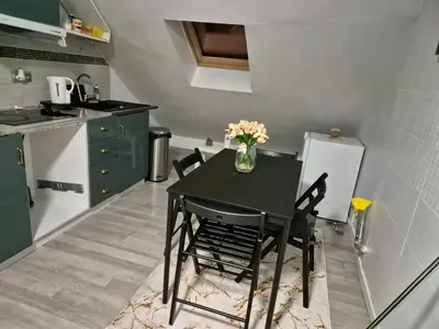Cuisine ou kitchenette dans l'établissement Appartement meublé , 1 chambre