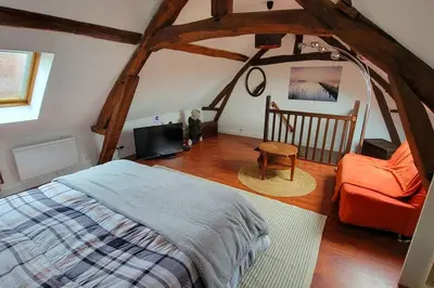 Un ou plusieurs lits dans un hébergement de l'établissement Le Duplex