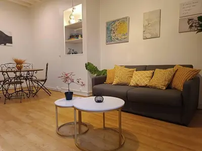 Coin salon dans l'établissement Appartement proche centre historique
