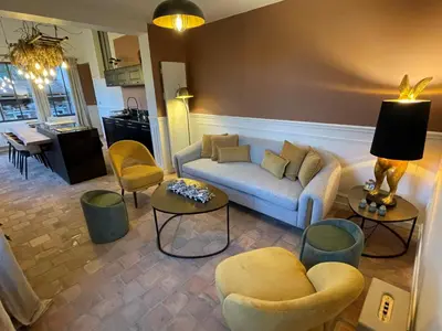 Coin salon dans l'établissement La Petite Maison de Giverny - Dernière minute -Chambre dans Gîte 5 étoiles au Cœur du village