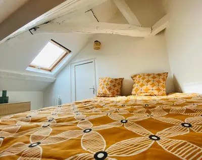 Un ou plusieurs lits dans un hébergement de l'établissement Le Duplex Rouen Cocooning Rouen Centre Parking