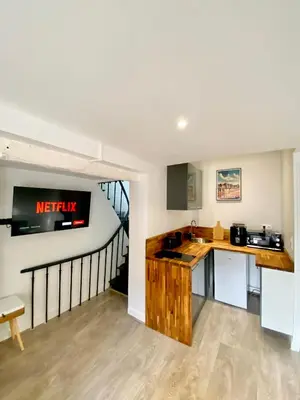 Cuisine ou kitchenette dans l'établissement Le Duplex Rouen Cocooning Rouen Centre Parking