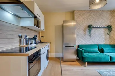 Cuisine ou kitchenette dans l'établissement Mathilde Appartement proche Clinique Mathilde