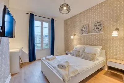 Un ou plusieurs lits dans un hébergement de l'établissement Mathilde Appartement proche Clinique Mathilde