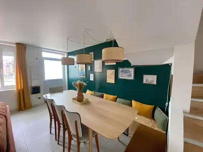 Coin salon dans l'établissement Maison familiale avec extérieur Ménage et linges inclus