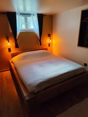 Un ou plusieurs lits dans un hébergement de l'établissement Château de la sagesse SPA