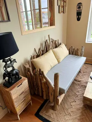 Un ou plusieurs lits dans un hébergement de l'établissement Duplex Safari jusqu'à 4 personnes, Spa, cinéma et lit sous les arbres, day use, 10 min centre
