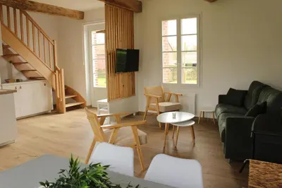Coin salon dans l'établissement La Poulinière