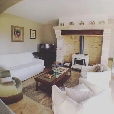 Coin salon dans l'établissement Le Relais des Prés - Gîte de grande capacité