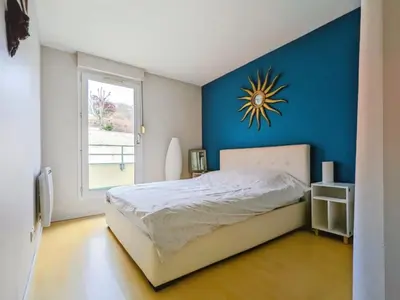 Un ou plusieurs lits dans un hébergement de l'établissement Duplex T2 Bords de Seine