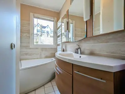 Salle de bains dans l'établissement Duplex T2 Bords de Seine