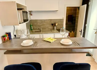 Cuisine ou kitchenette dans l'établissement La vacancière - 308